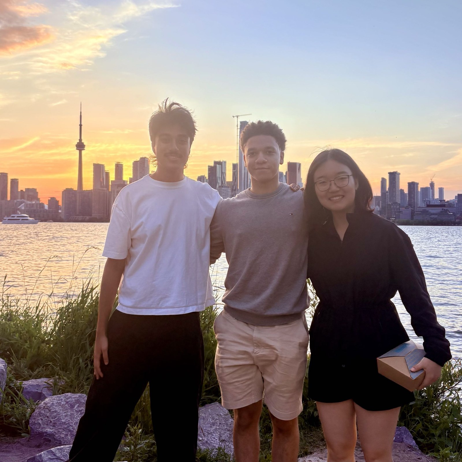 The three Toronto Hide N Seek hosts together by the Toronto skyline